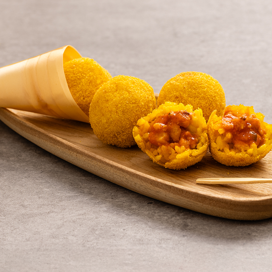 Rice arancine with cuttlefish sauce