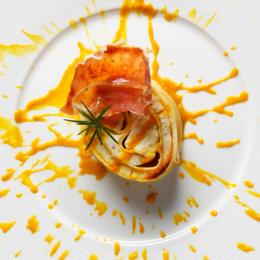 Ricciole with Smoked Ham and Provola, Pumpkin Brandy Sauce with Mint, and Speck Chips