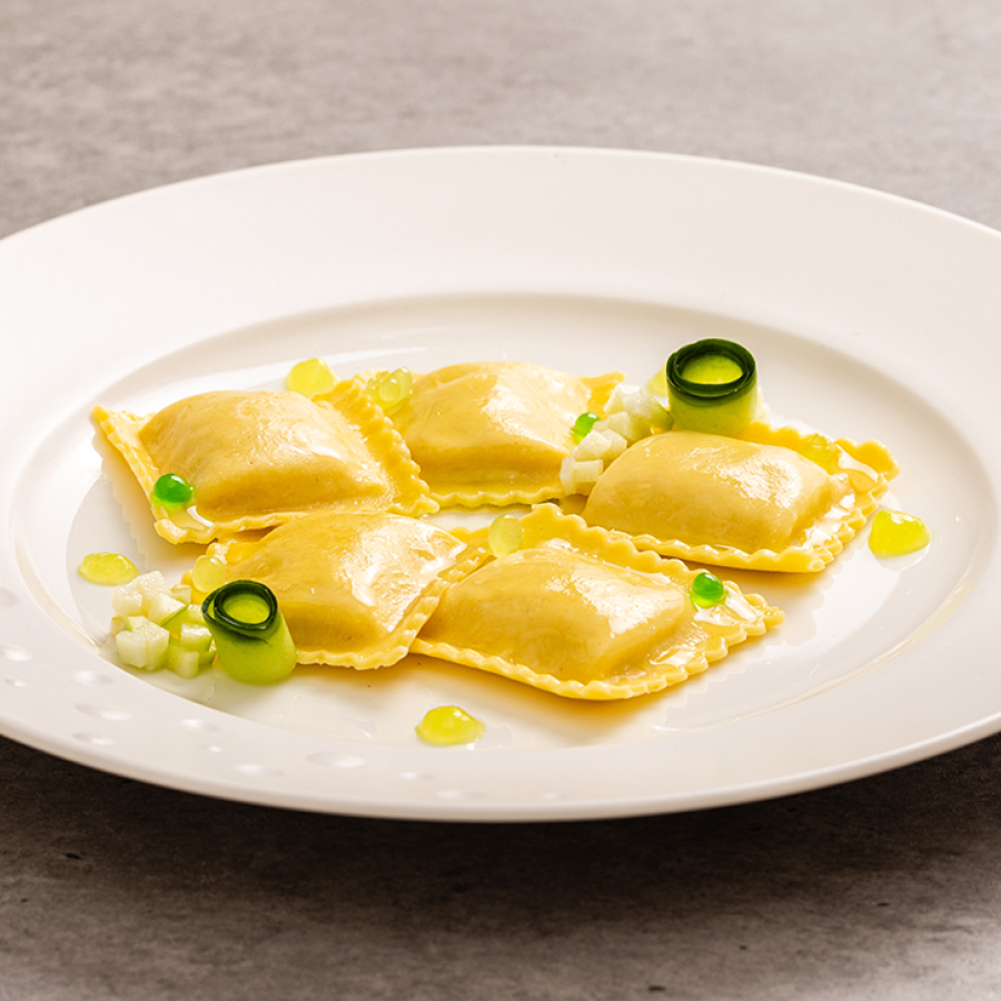 Tortelli with amberjack, green apple, cucumber gel, lime caviar, and basil