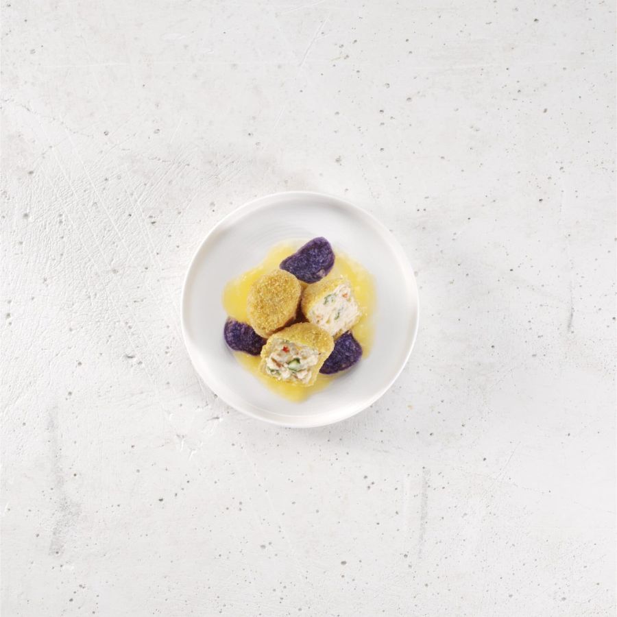 Paccheri in Taralli-Kruste mit Königshummer und Altedo-Spargel, gelbe Datterini-Mayonnaise