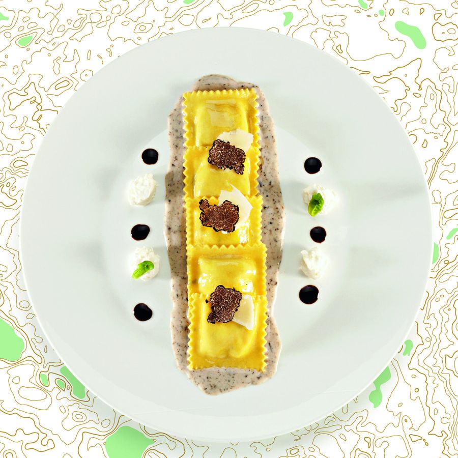 Tortelli with buffalo mozzarella, tomato and basil, with black truffle sauce