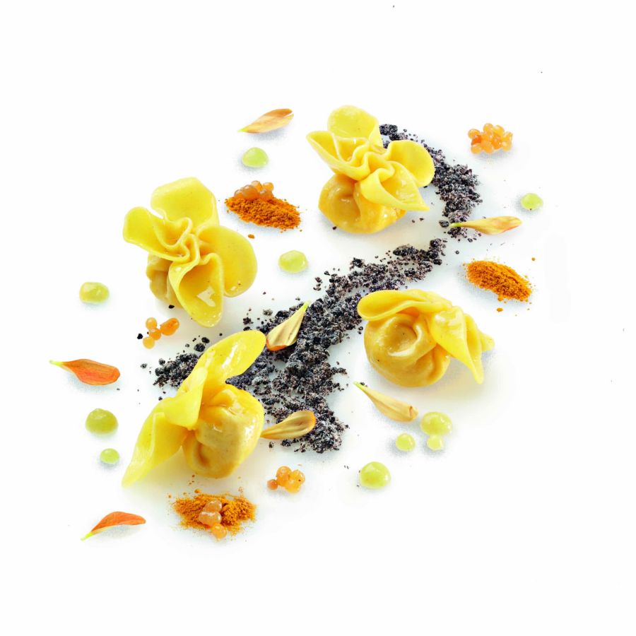 Fiocchi with cheese and pears with trout roe in two saltings: pear puree and matcha tea, sorrel stems, and black sand